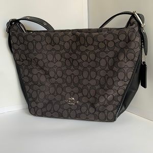 Black and gray Coach purse